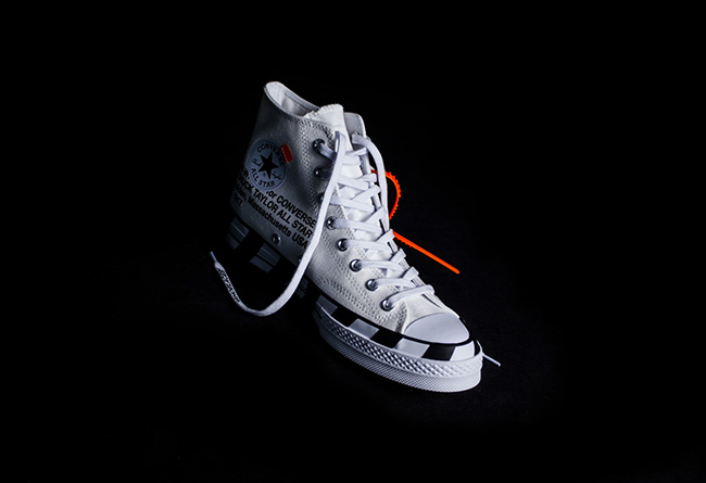 converse off white on foot